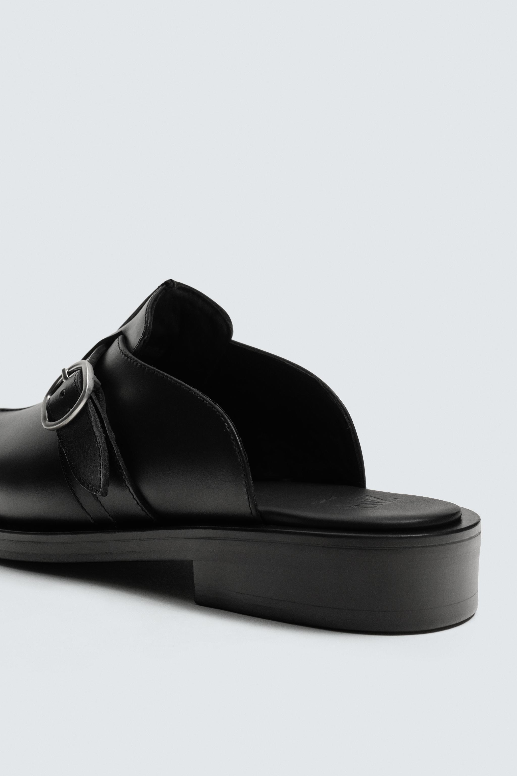 BUCKLED LEATHER CLOGS